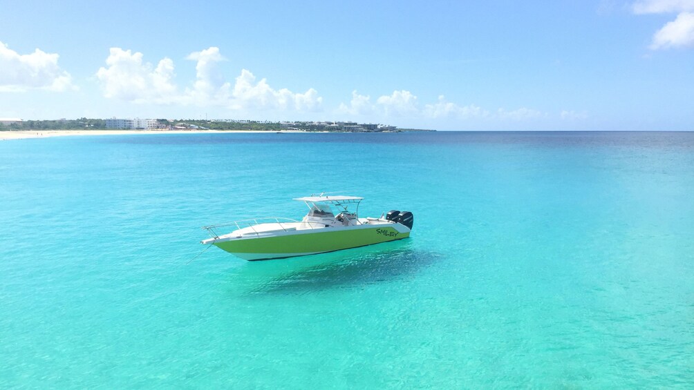 Boat anchored in clear blue water off the coast of St Martin