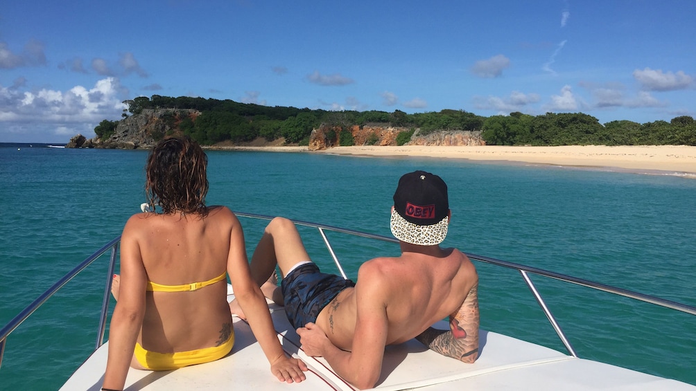 Couple lounging on a boat off the coast of St Martin