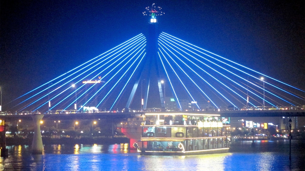 Night cruise with bridge in sight in Da Nang, Vietnam 