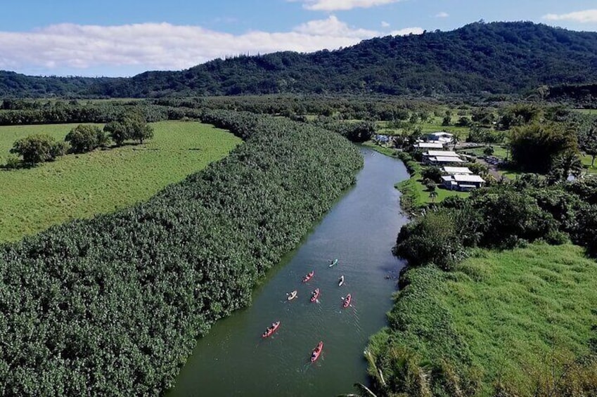 Paddle 1 mile downstream to Hanalei Bay for snorkeling