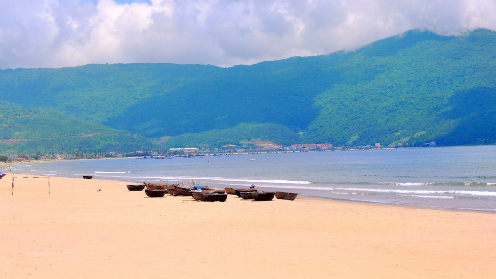 Small boats on a beach in Da Nang