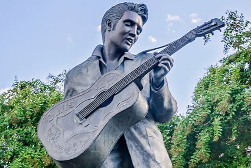 Iconic Elvis Statue on Beale Street: A Glimpse of the Magic Awaiting You in Memphis! Join us on an unforgettable journey through the heart of the blues and the birthplace of Rock 'n' Roll.