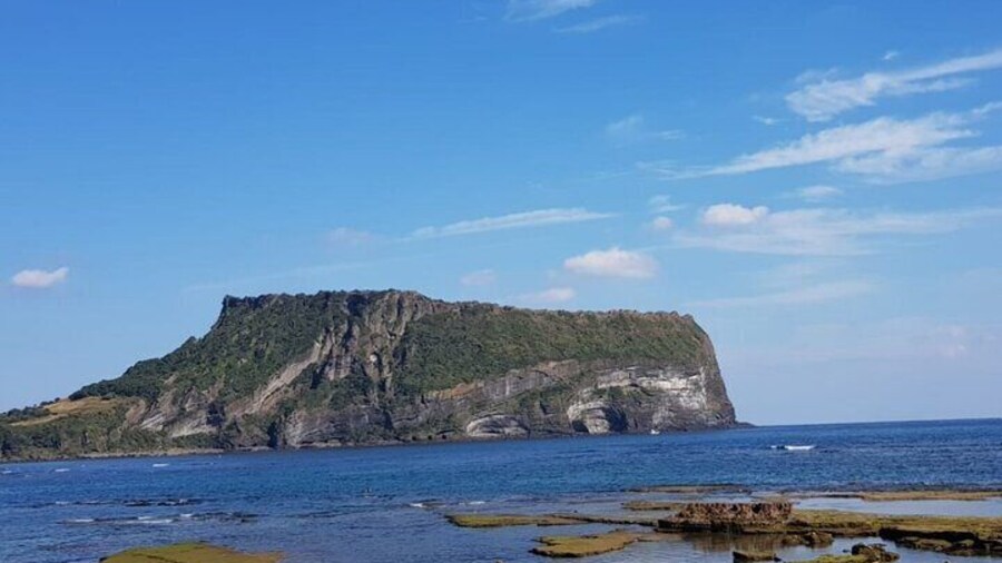 jeju island Seongsan Ilchulbong, also called ‘Sunrise Peak’, is an archetypal tuff cone formed by hydrovolcanic eruptions upon a shallow seabed about 5 thousand years ago.