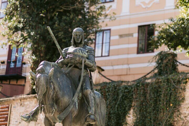  St. George on his horse praying, after slaying the dragon