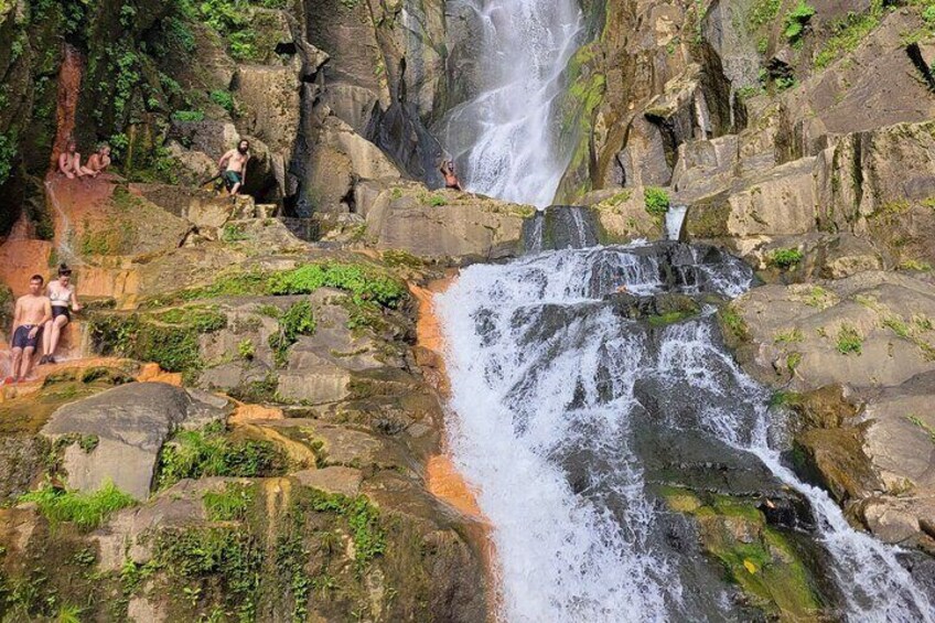 Climb to the bottom of the falls to enjoy a cold and hot bath