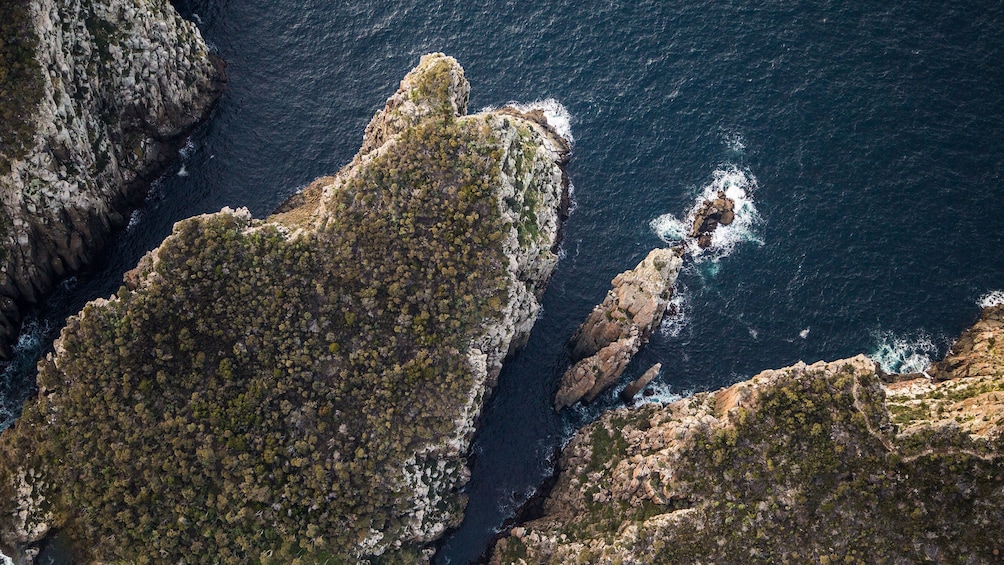 Show item 5 of 9. Ariel view from above at the sea cliffs in Hobart