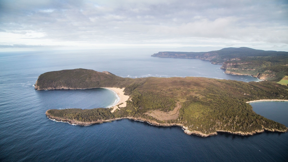 Show item 2 of 10. View of cliffs and peninsula at Tasman Island