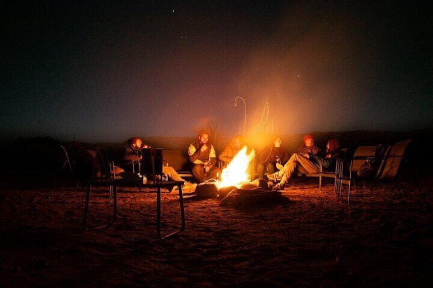 Wine and hot drinks around the campfire