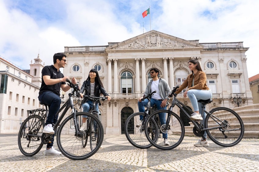 Lisbon 360 City Tour: Bike tour, Boat Trip & Helicopter Flight