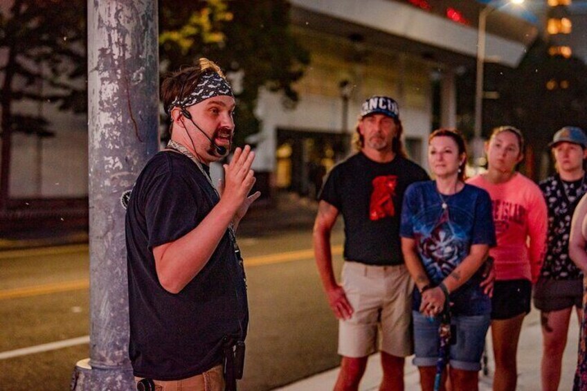 Our guide telling an epic tale of hauntings in the beautiful city