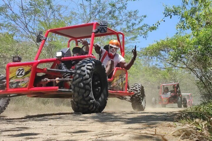 Dune Buggy - Marysol Tours - In the heart of the tropical forest lies an adventure like no other. Join Marysol Tours on a thrilling dune buggy ride, soaring over the rugged terrain.