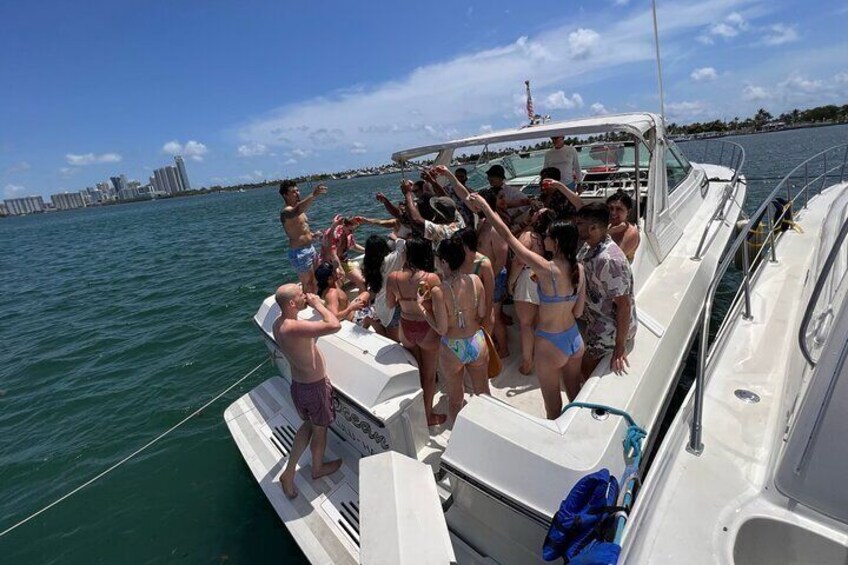 Premium Miami Yacht Tour Experience: Captain, Champagne & Party!