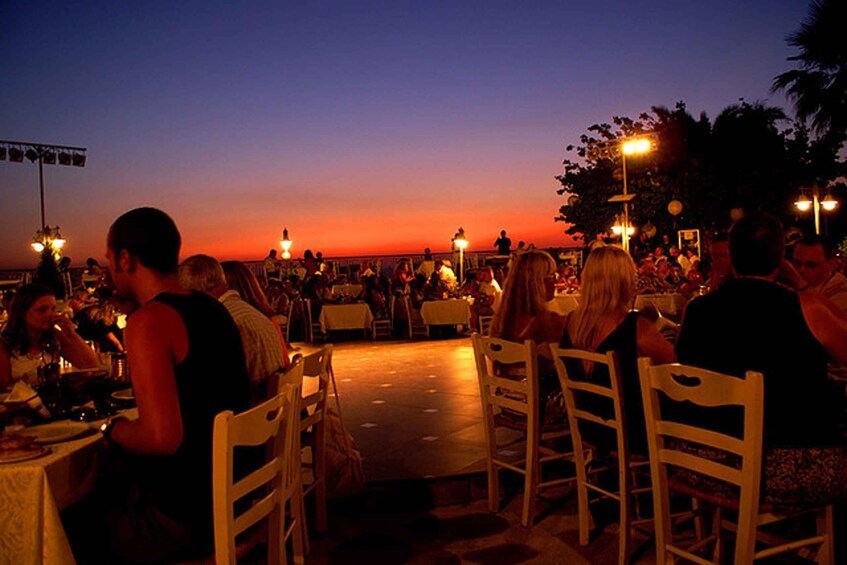 Kos: Greek Dinner with Music, Dancing, and Unlimited Wine