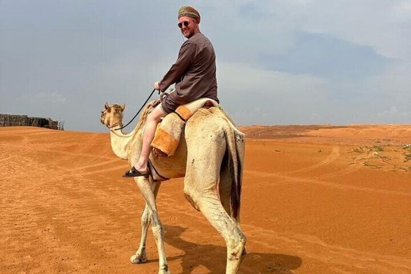 Camel ride at Wahiba Sands Desert