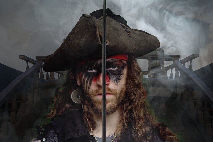 Guests enjoying a thrilling tale in the chilly OBX night.