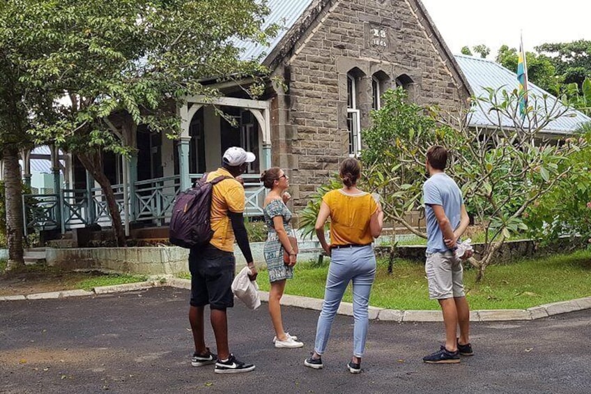 Hearing the history of one of Grand Baie's oldest buildings