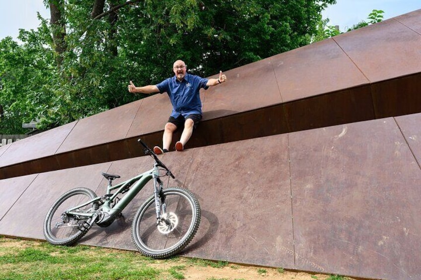 Look for this giant metal paper airplane at our meeting point!