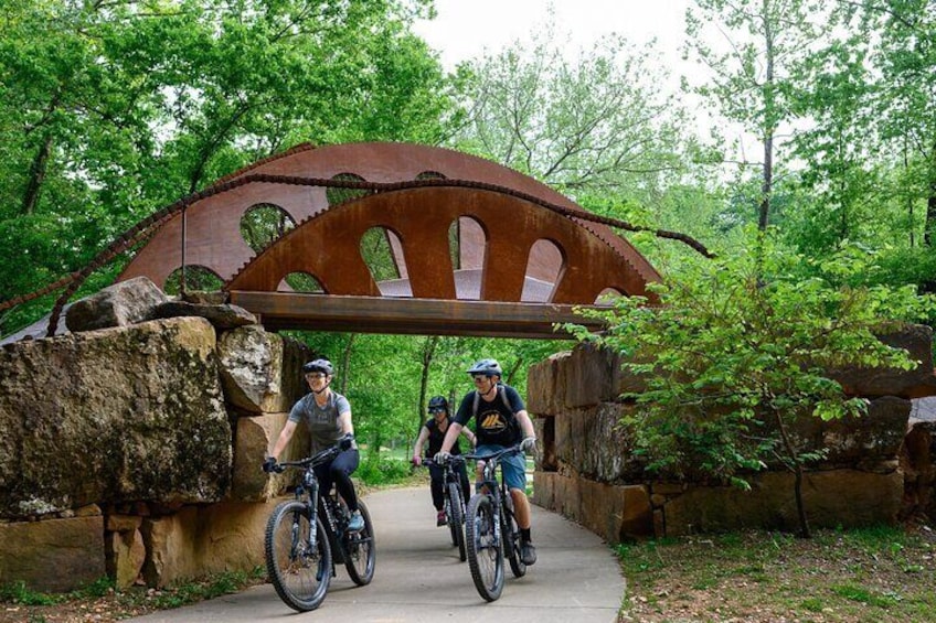Your tour will take you along the Razorback Greenway and other paved trails to discover beautiful art and nature along the way.