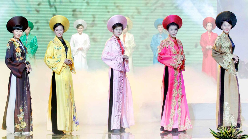 Models posing in outfits in Hoi An