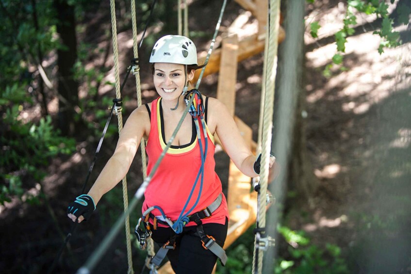 Picture 2 for Activity From Montreal: Treetop Trekking, Ziplines and beach activity