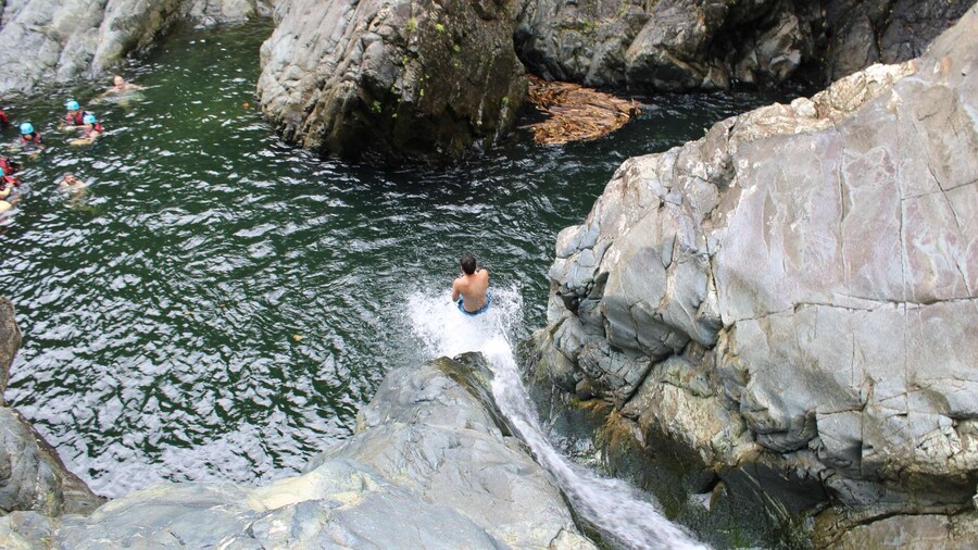 From San Juan: El Yunque Waterslide with Transportation