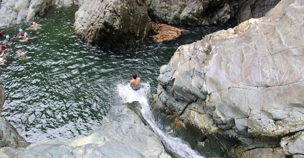 From San Juan: El Yunque Waterslide with Transportation