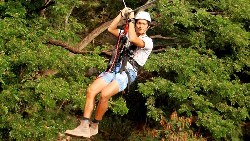 Close view of a participant on the Oahu Zipline Tour