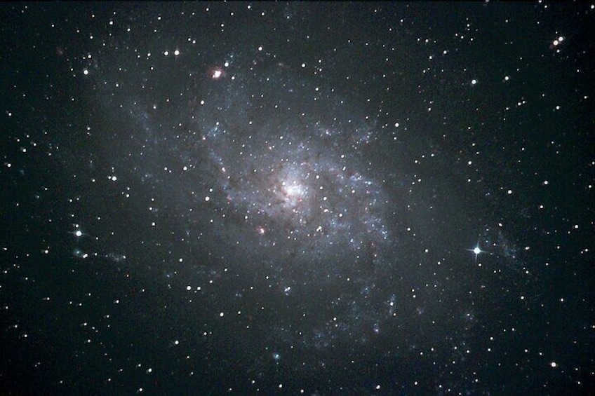 Photo of the Pin Wheel Galaxy taken through the biggest telescope in the Canadian Rockies.