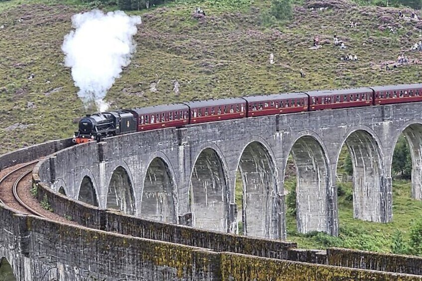 The Jacobite Train crossing Harry Potter Bridge Glenfinnan