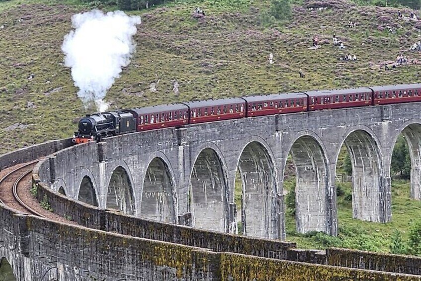 The Jacobite Train crossing Harry Potter Bridge Glenfinnan