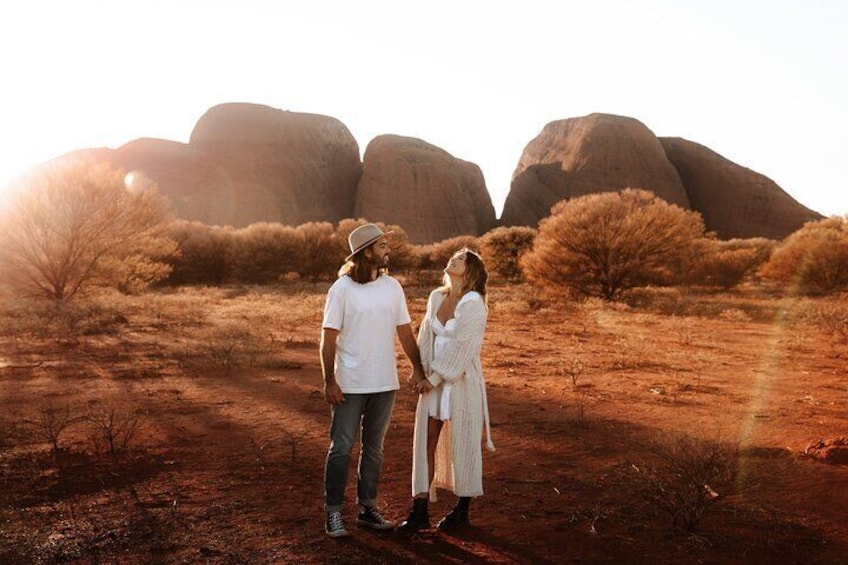 Couple at Kata Tjuta in the early morning, Uluru Australia's Red Centre