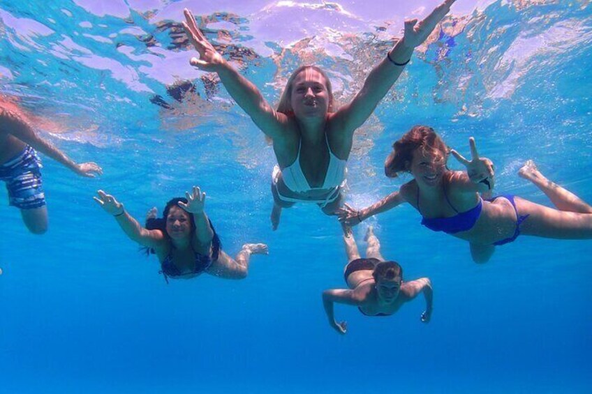 swimming with friends in ibiza