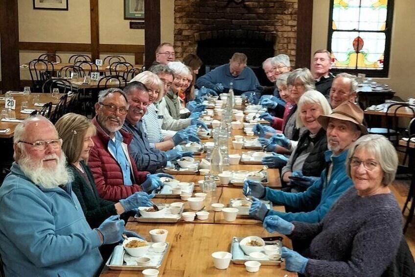 Group of visitors taking part in a Strudel construction. Permission to use this photo for a Hahndorf Walking Tours Viator listing only. 