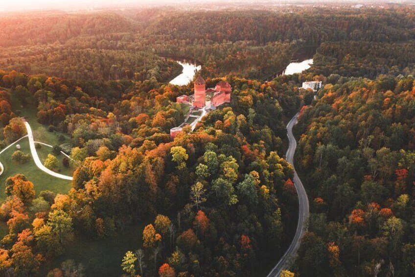 Turaida castle from bird view in autumn sunset