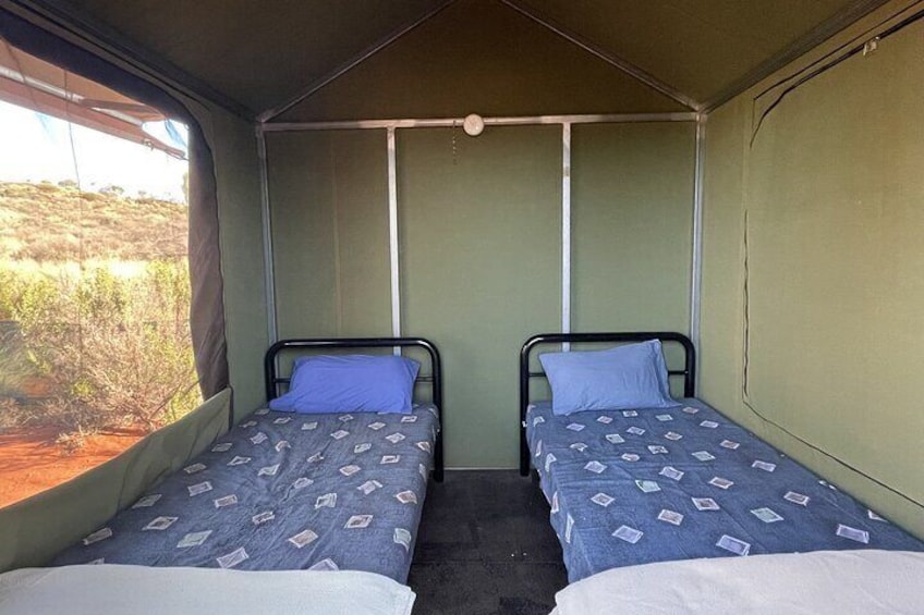 Our permanent safari tents are configured with twin share single beds, includes mattress, linen and pillow