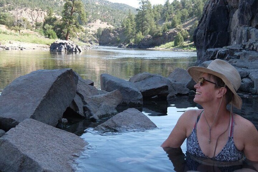 soaking in the riverside hot springs