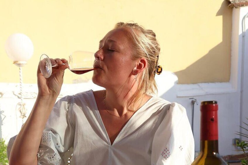 Marloes enjoys a Mallorcan red wine on our rooftop terrace.