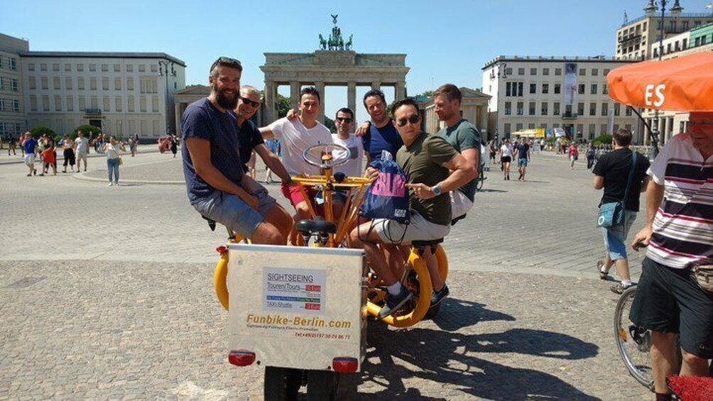 Happy customers from Australia on one of our FunBikes / Teambikes / ConferenceBikes in front of the Brandenburg Gate