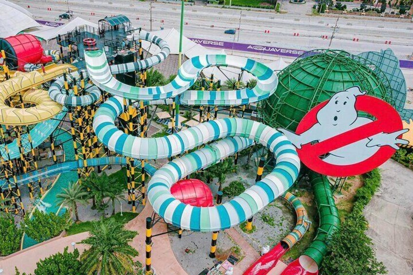 Dive into the world's first and largest Ghostbusters sphere-shaped water slide, with the Marshmallow Man lurking inside for a spine-tingling escapade!