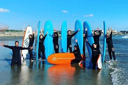 Small Group Surfing Experience with Transport in Porto