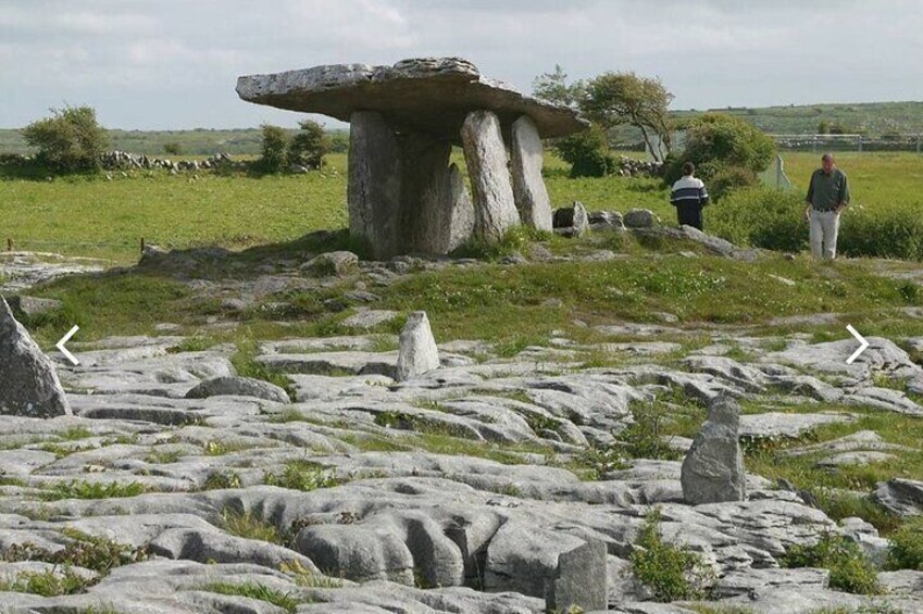 Poulnabrone Dolmen. Feel a sense of peace as you stand on the limestone mountain of the Burren. 