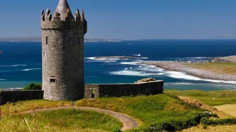 View of Doolin from the Cliffs of Moher. You can see the Aran islands just behind the Tower.