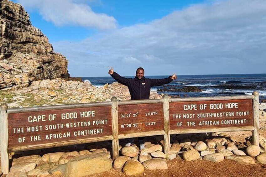 Me at the cape of good hope board. 