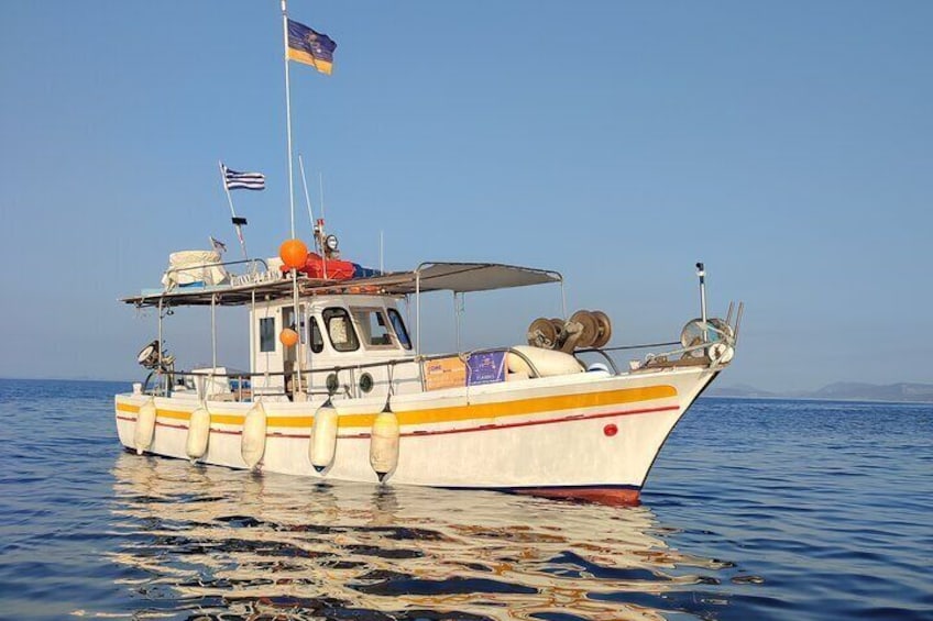 Our traditional wooden fishing boat, spacious for everyone to enjoy a day at sea