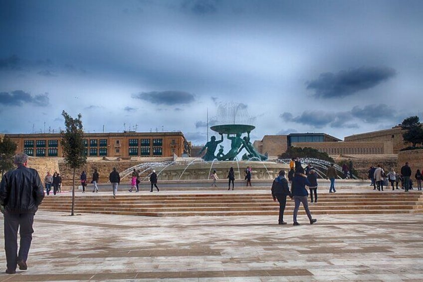 Triton Fountain situated just outside the city gates, the fountain consists of three enormous bronze statues of Triton, the Greek god of the sea, holding up a large basin.