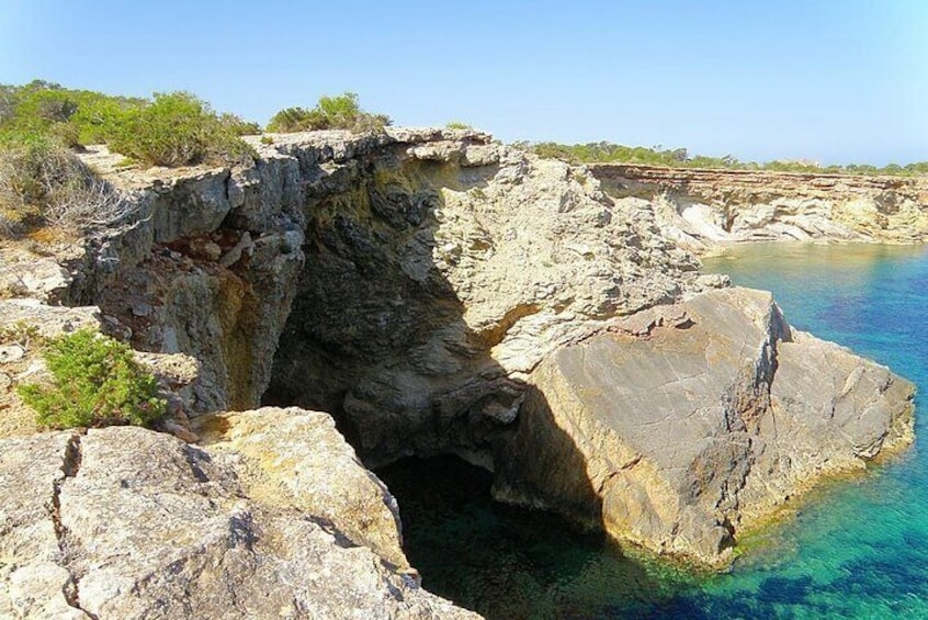 Tour in Seabob Secret Caves of Cala Bassa with Paella and Sangria