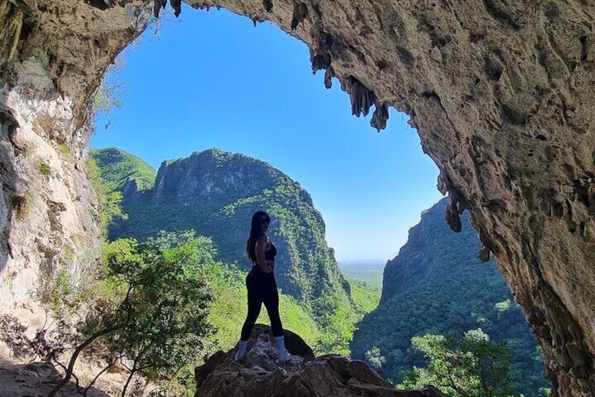 Enjoying the view in the holed cave