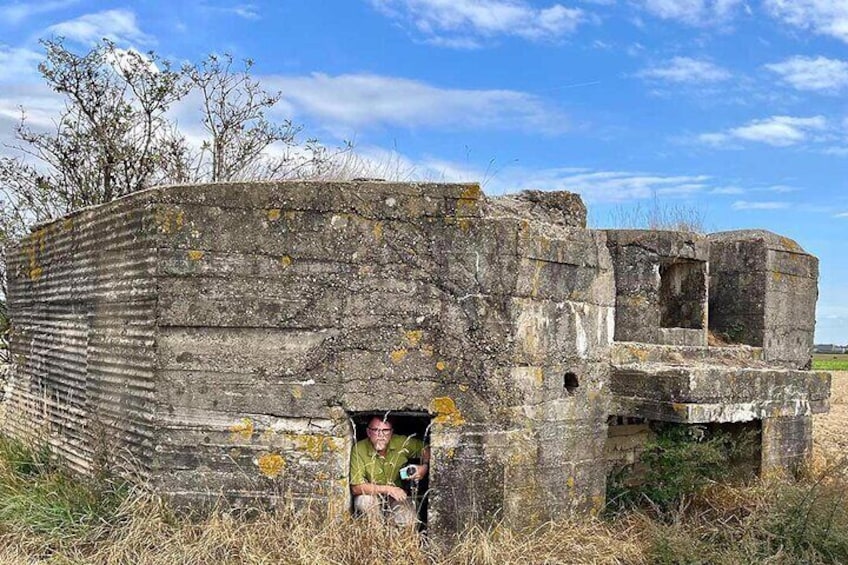 Client inside a German bunker, Aubers Ridge, France.