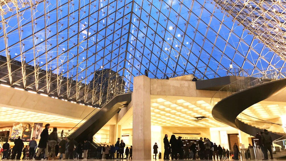 View of the glass pyramid ceiling of the Louvre Museum in Paris