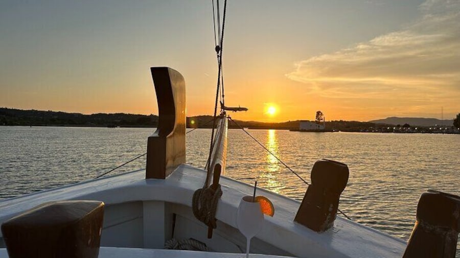 Soothing Sunset Escape: A Wooden Boat Cruise with Cocktails & Finger Food Delights